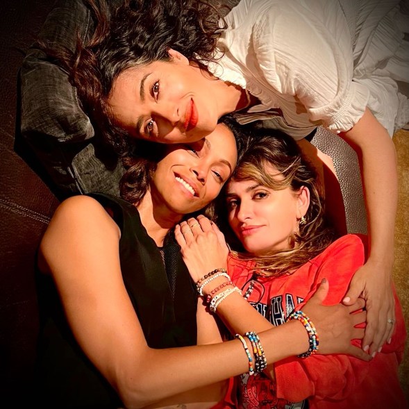 salma hayek, penelope cruz and zoe saldana lying on the floor together