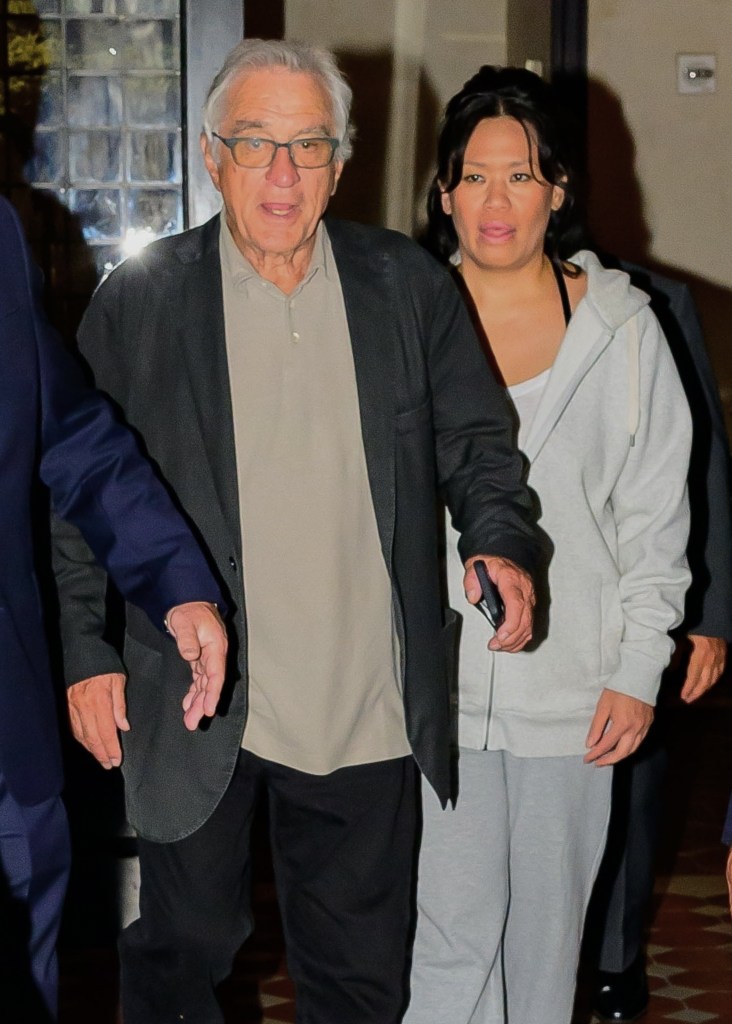 Robert De Niro leaves his 80th birthday party with partner, Tiffany Chen.