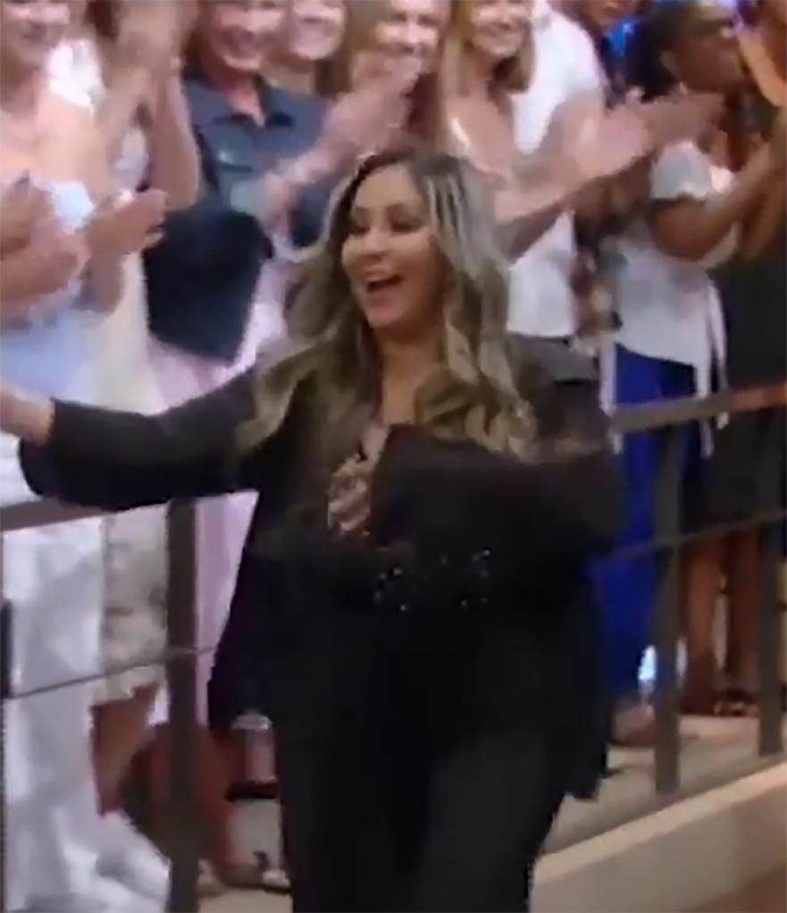 Snooki grabbing top during "Live With Kelly and Mark"