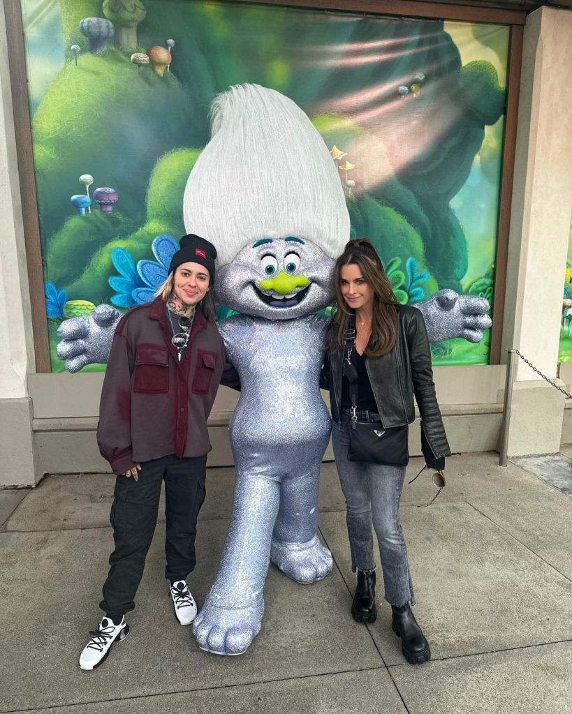 morgan wade, a life-size troll and kyle richards