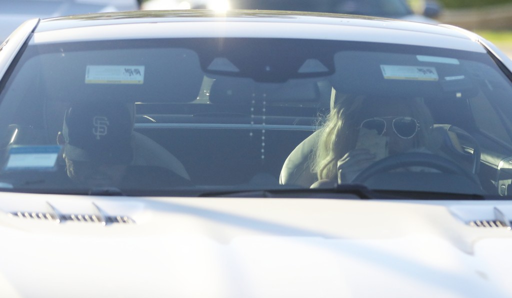 Britney Spears and Paul Richard Soliz inside a car together.