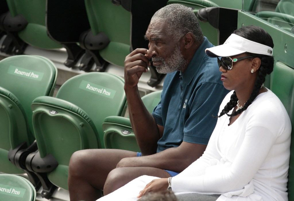 richard and lakeisha williams watching tennis in the stands