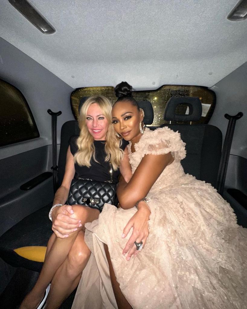 Cynthia Bailey and Sutton Stracke in car together.