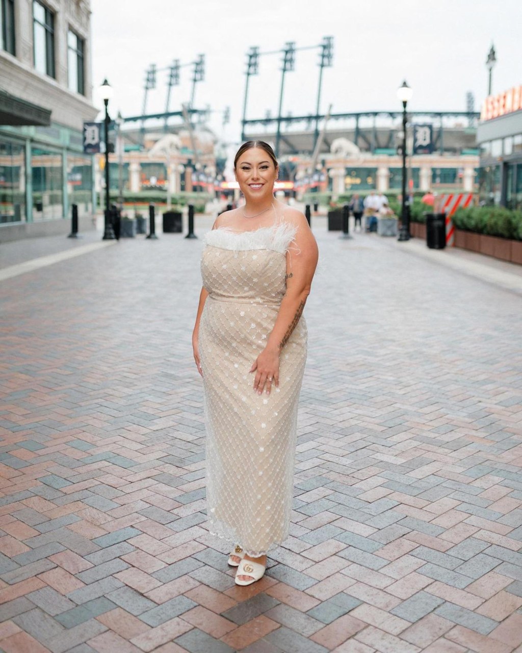 Alaina Scott posing in a gown.