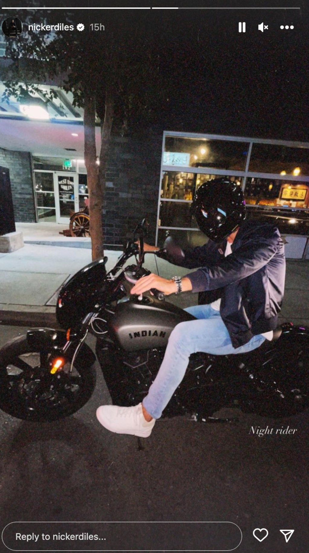 Nic Kerdiles on a motorcycle.