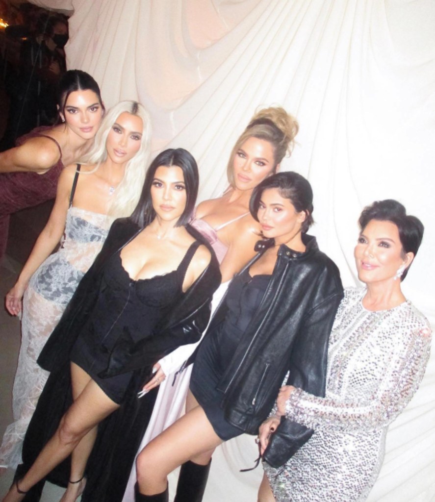 The Kardashian-Jenners posing together.
