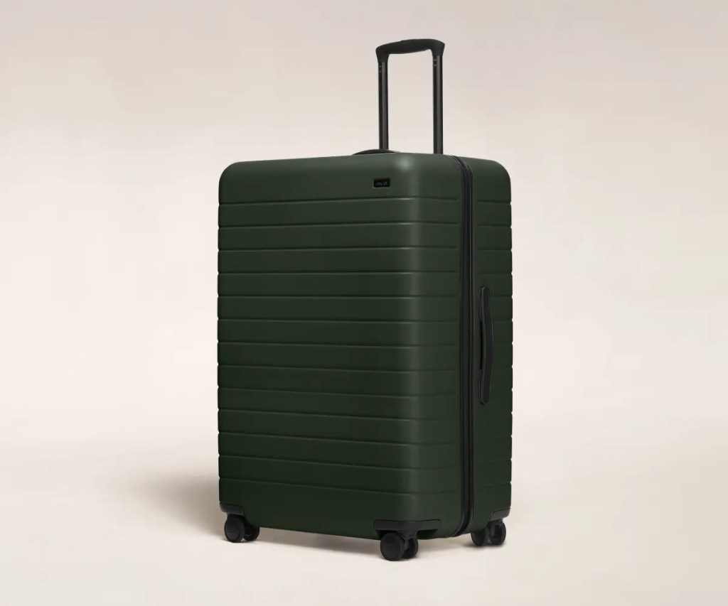 Large hunter green luggage