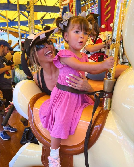 scheana shay and her daughter on a carousel