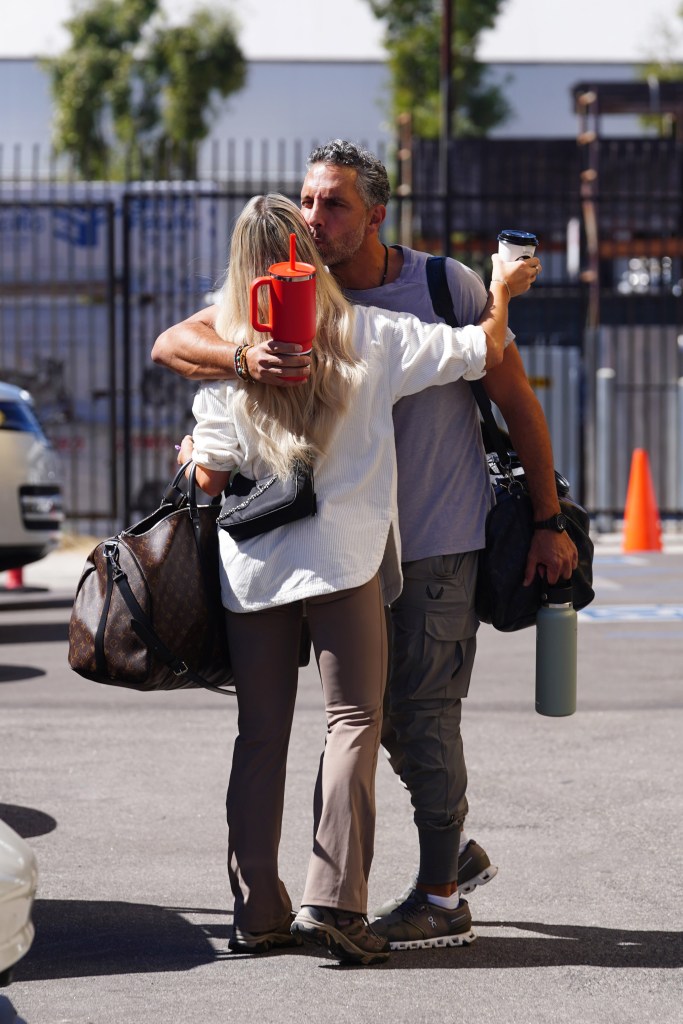 Mauricio Umansky  Emma Slater hugging