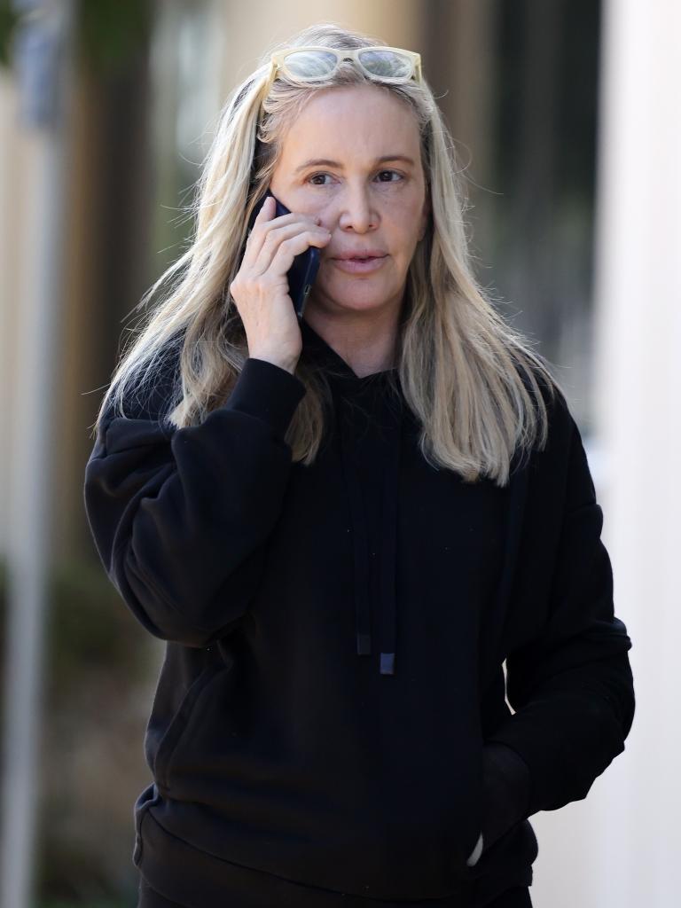 Shannon Beador walking and talking on the phone