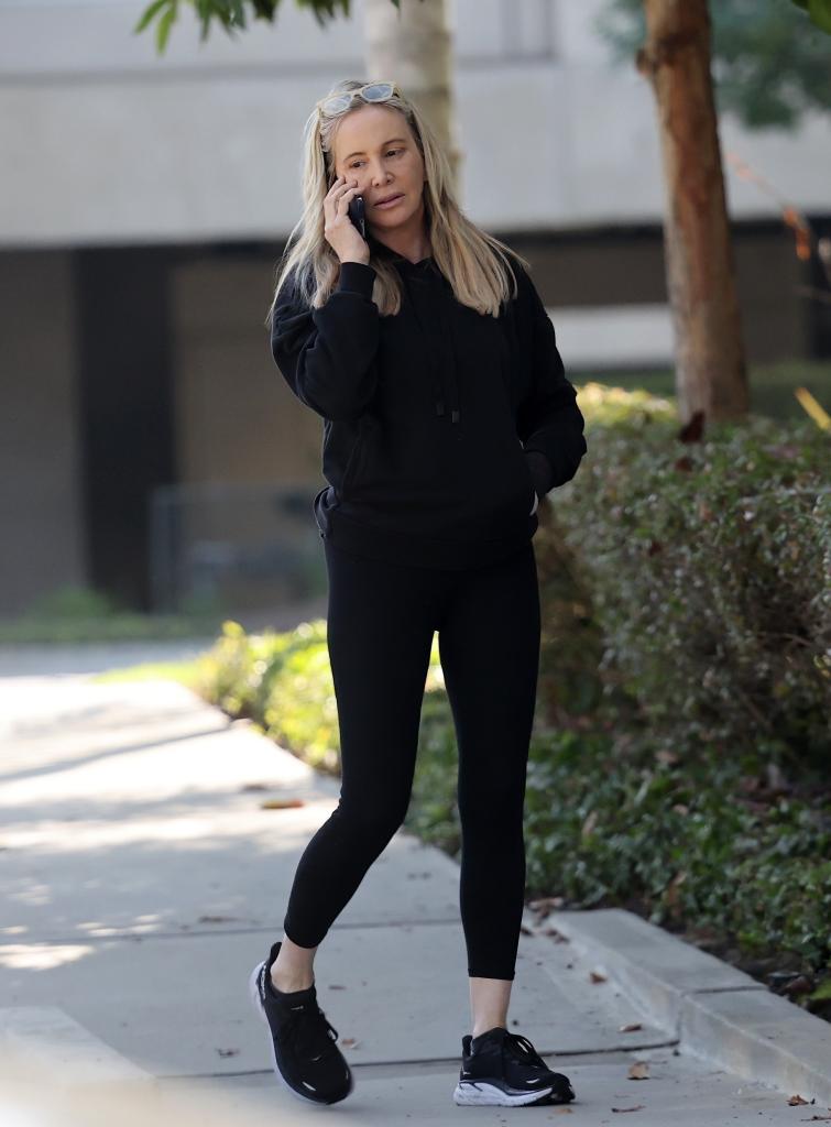 Shannon Beador walking and talking on the phone