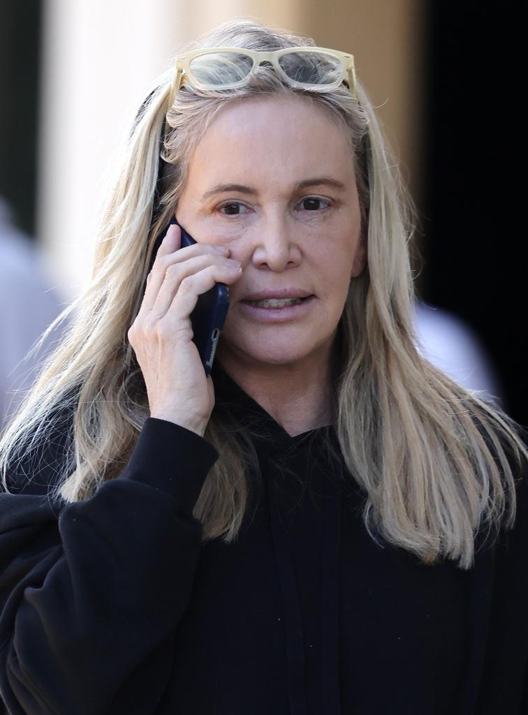 Shannon Beador walking and talking on the phone