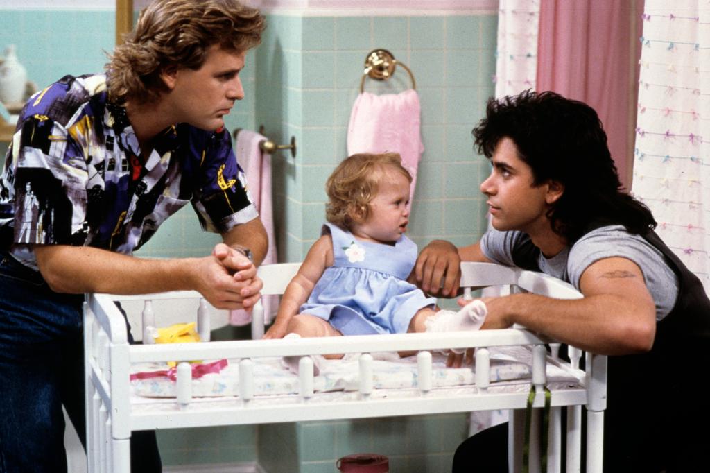 Dave Coulier, one of the Olsen twins and John Stamos on "Full House."