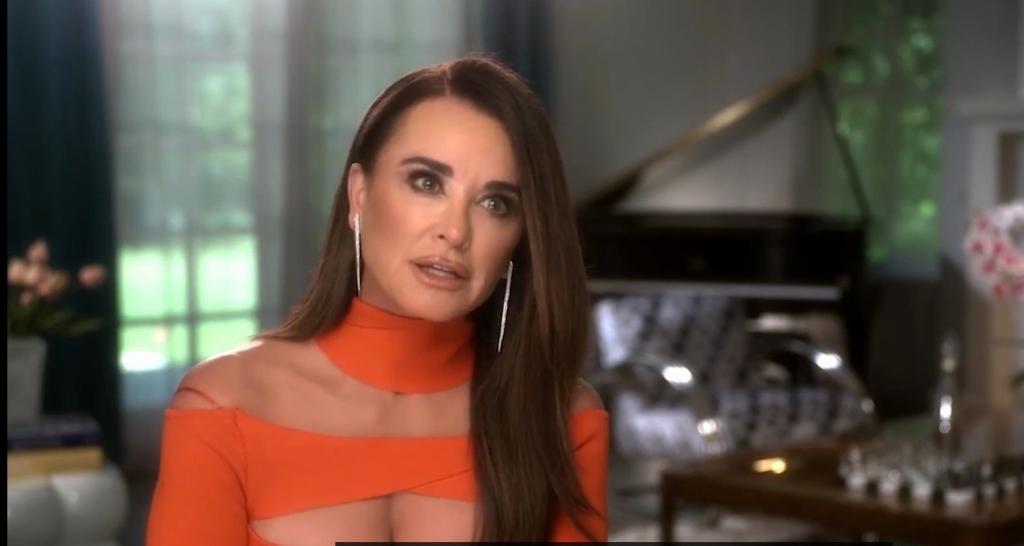 Kyle Richards talking in a confessional