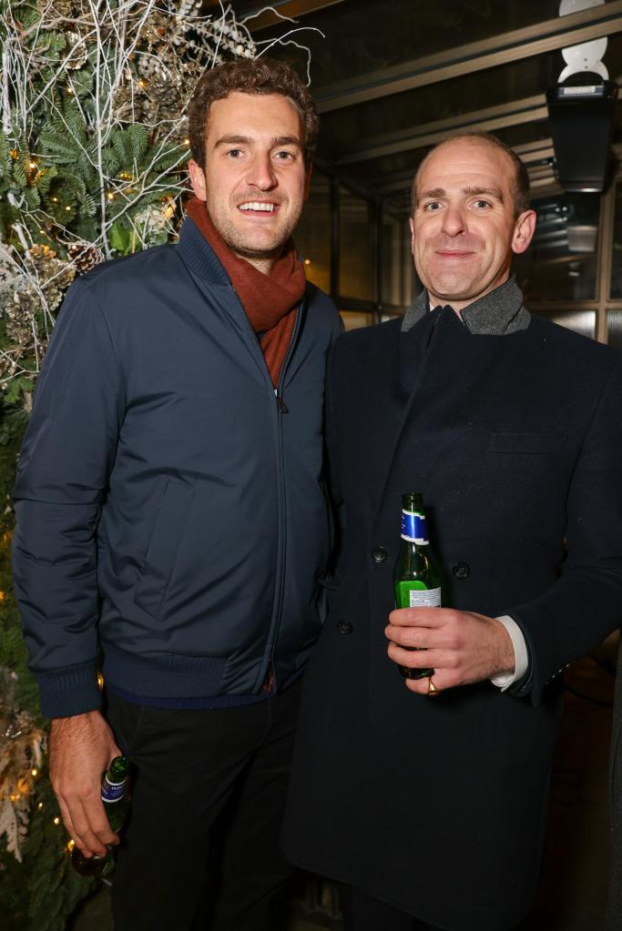 Peregrine Pearson with a friend at an event.