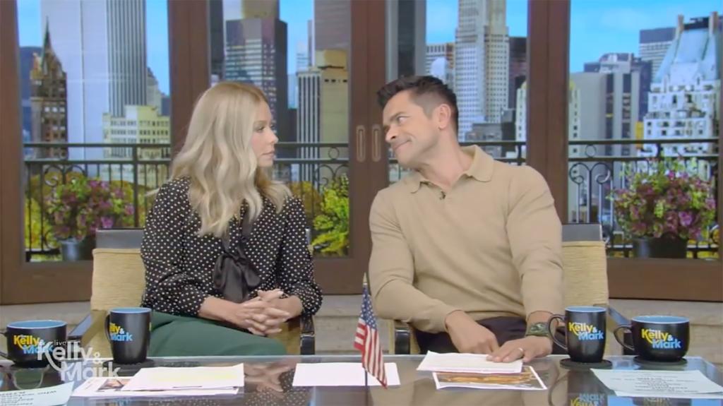Kelly Ripa and Mark Consuelos talking on "Live"