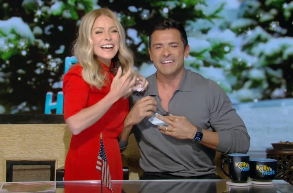 Kelly Ripa and Mark Consuelos talking on "Live"