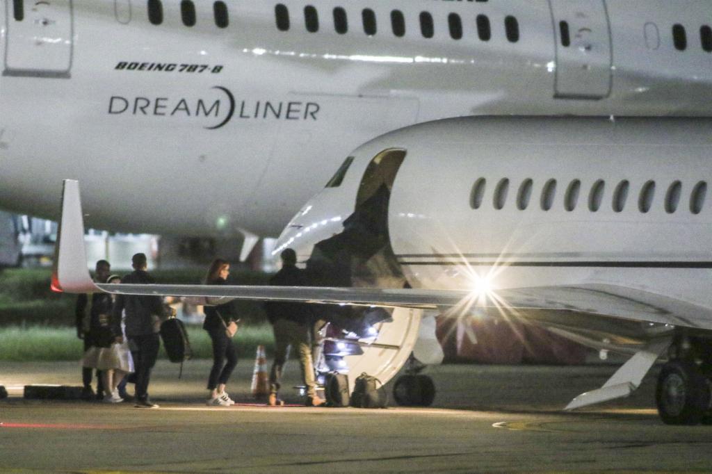 Taylor Swift boarding her plane.