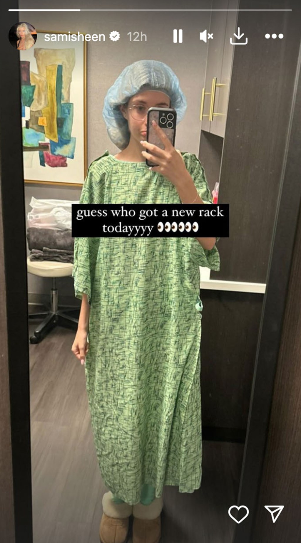 A mirror selfie of Sami Sheen in a hospital gown 