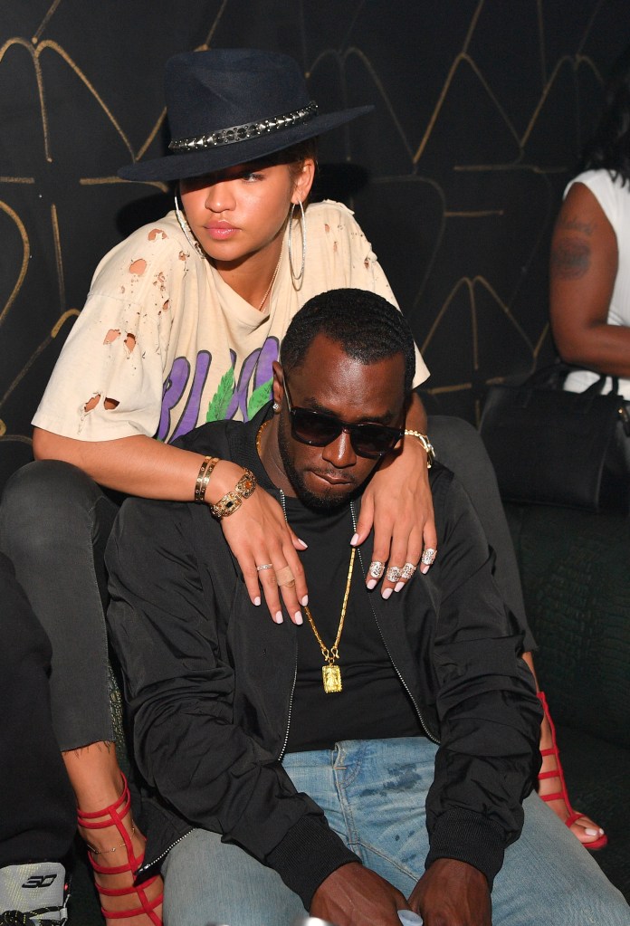 Sean Diddy Combs and Cassie sitting together