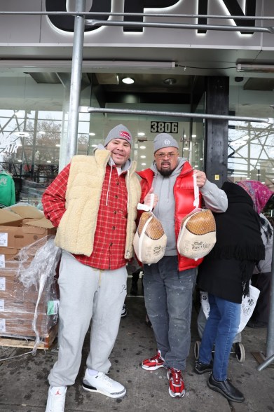 Fat Joe and his friends and family handed out Thanksgiving meal items to about 5,000 underprivileged families at his UP NYC stores in the Bronx and Washington Heights.
