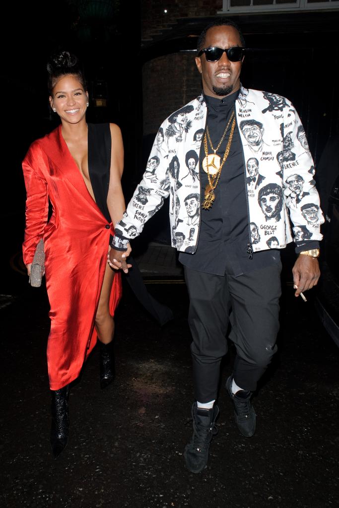 Sean Diddy Combs and Cassie holding hands