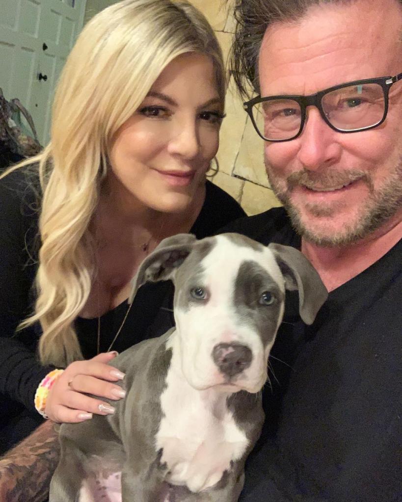 Tori Spelling and Dean McDermott with their dog.