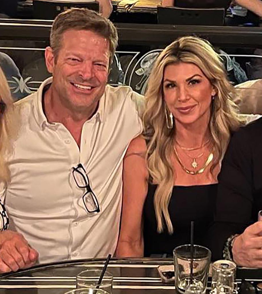 John Janssen and Alexis Bellino posing together 