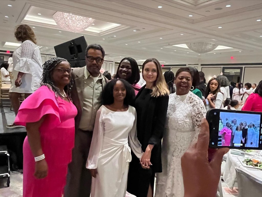 Angelina Jolie and Zahara Jolie-Pitt posing at an AKA luncheon.