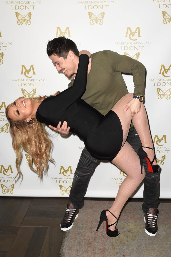 Mariah Carey (L) and Bryan Tanaka 