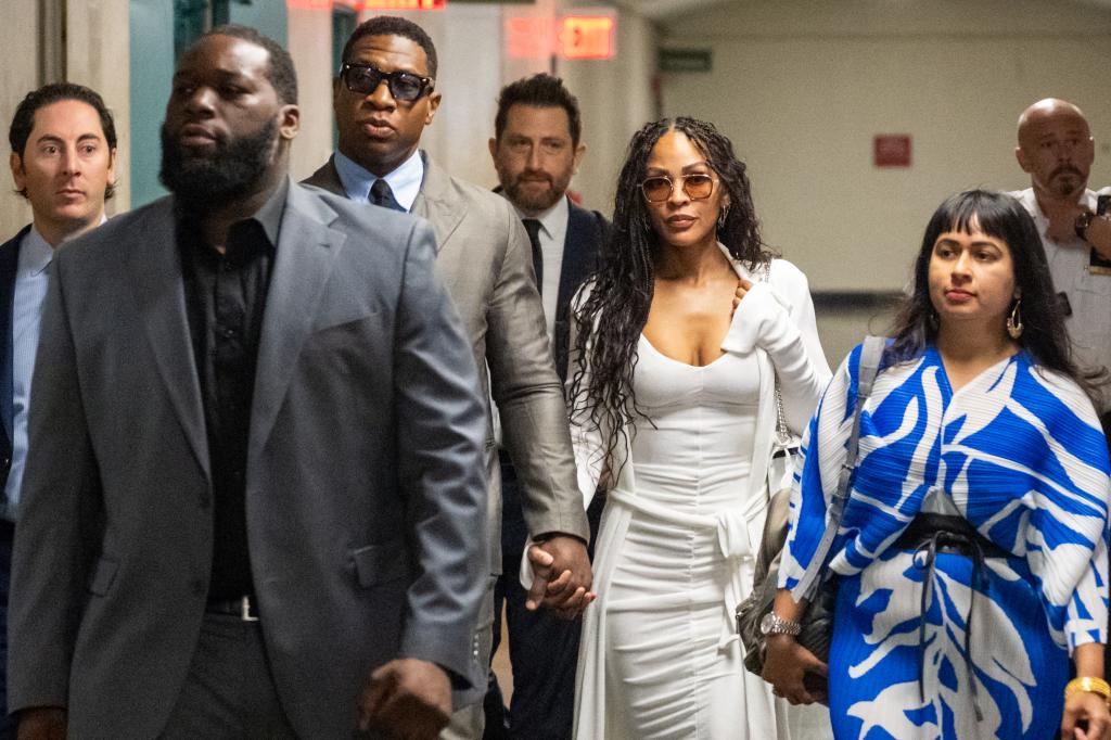 Jonathan Majors and Meagan Good arriving at court.