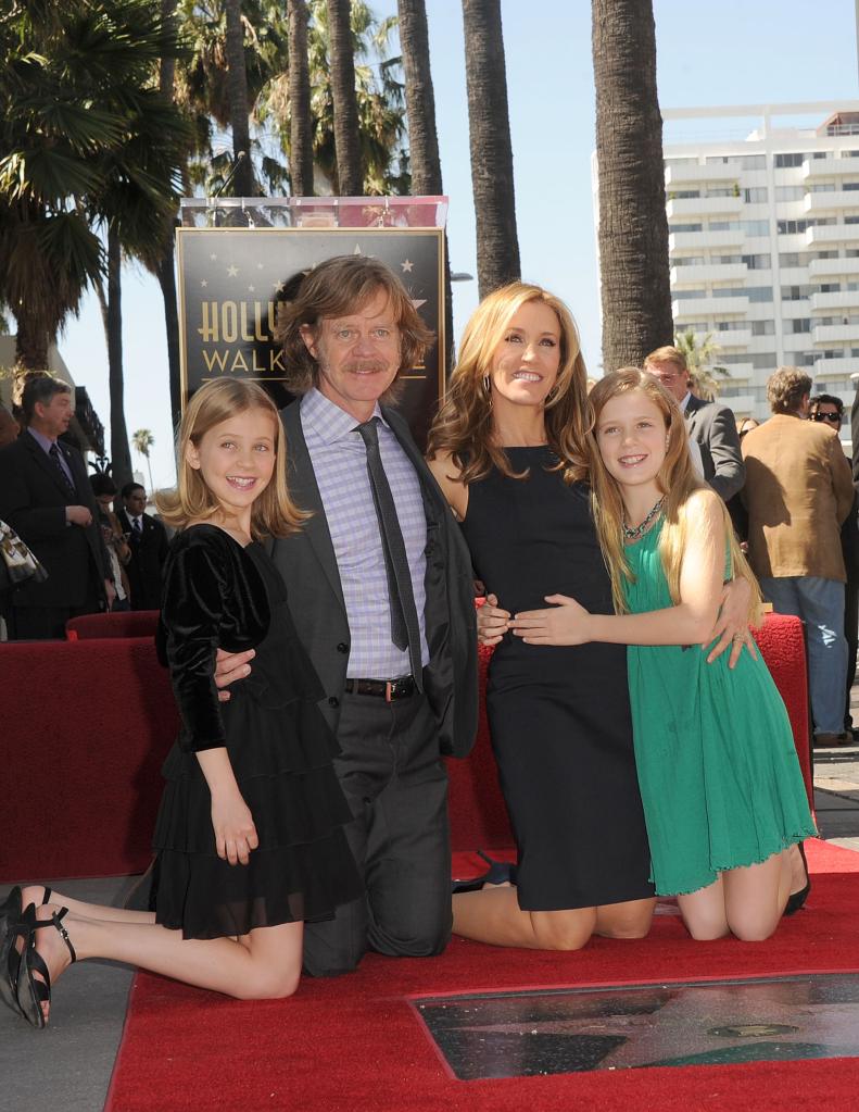 William H. Macy and Felicity Huffman pose with there daughters Sophia and Georgia