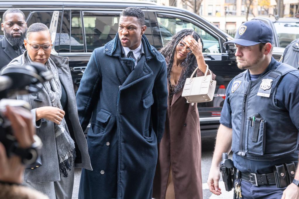 Jonathan Majors and Meagan Good arriving at court.