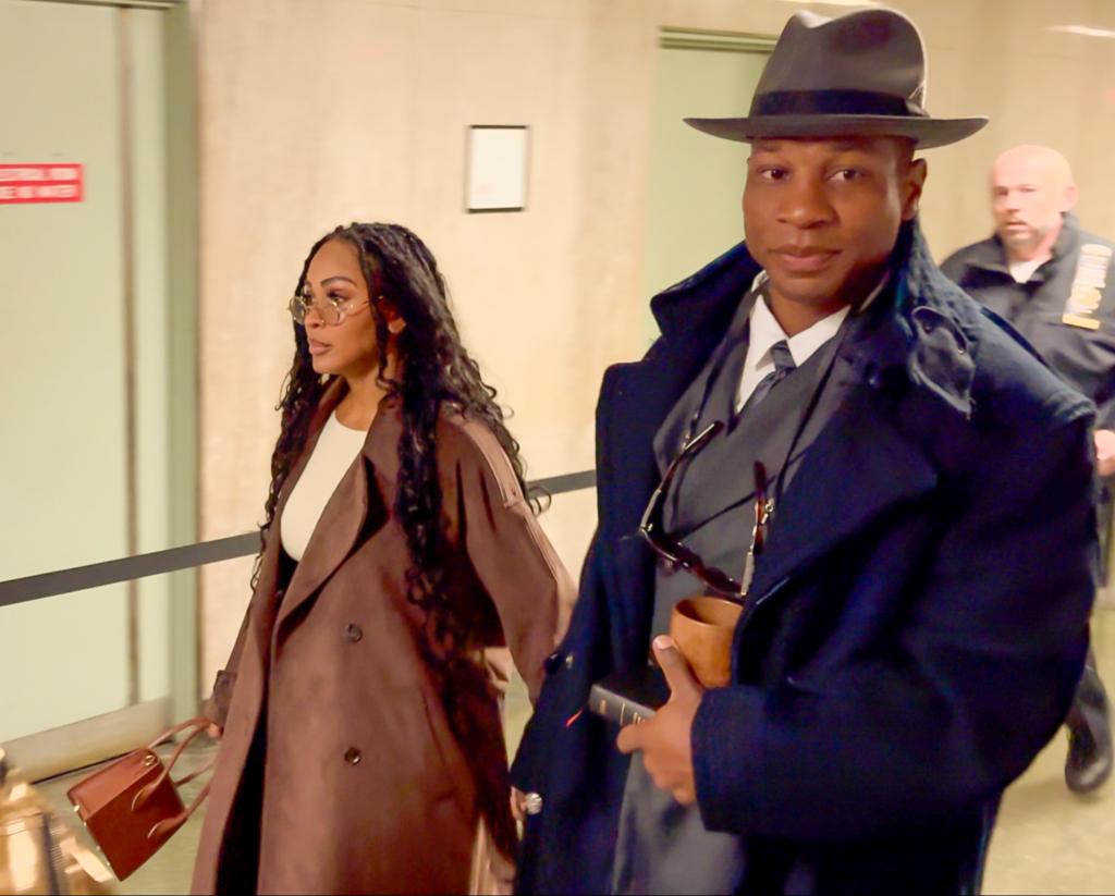 Jonathan Majors and Meagan Good arriving to court.