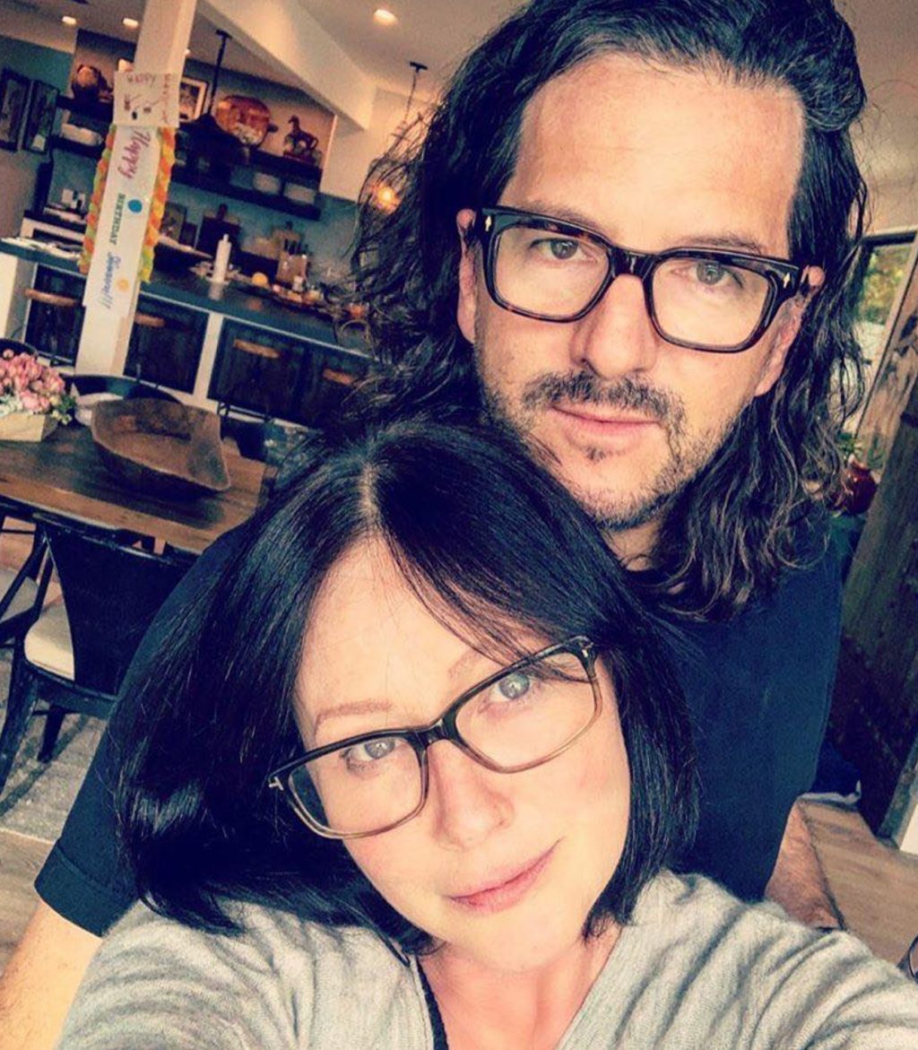 Shannen Doherty and Kurt Iswarienko takes a selfie.