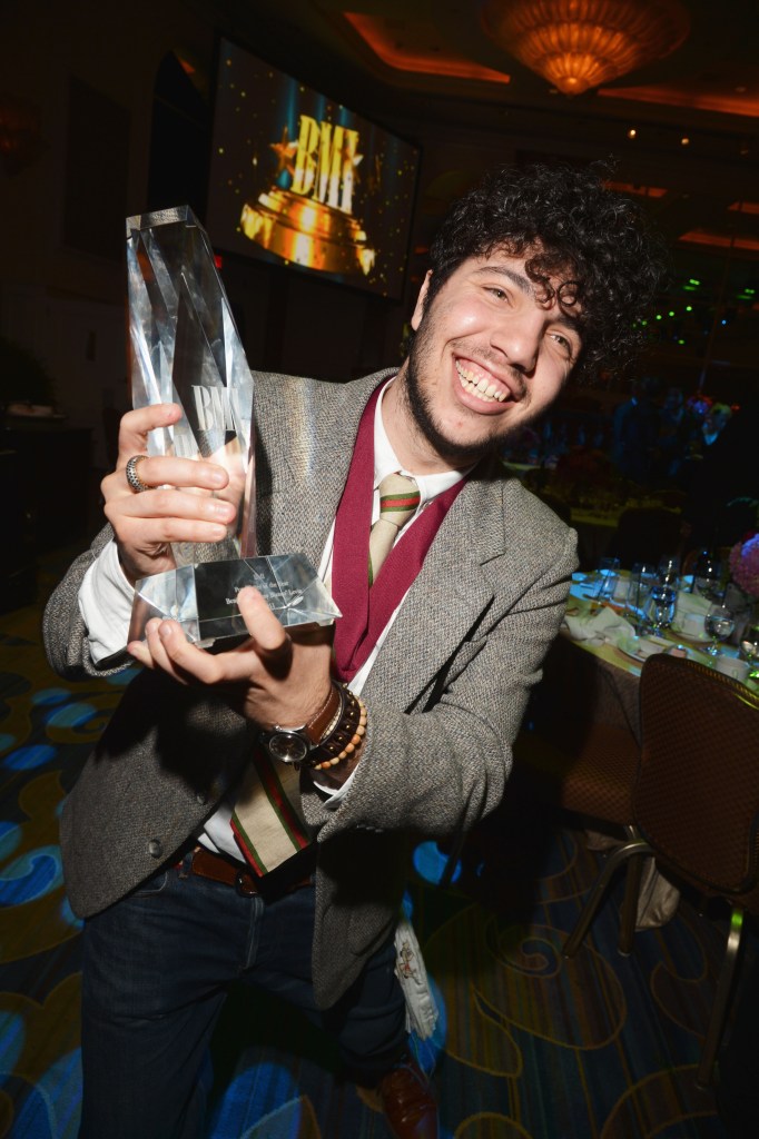 Benny Blanco with a trophy