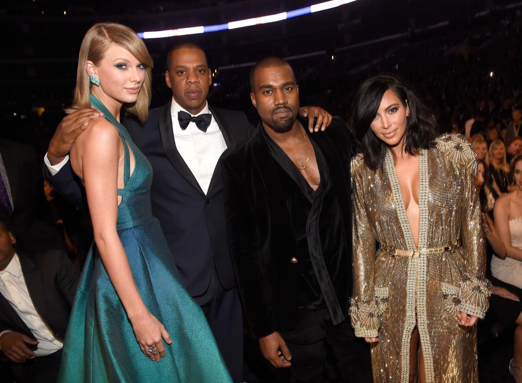 Taylor Swift posing with Kanye West, Kim Kardashian and Jay-Z.