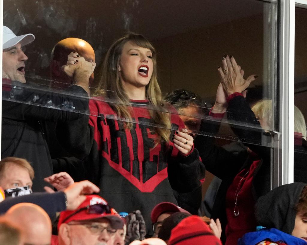 Taylor Swift reacts to a Chiefs touchdown in the 3rd quarter against the Buffalo Bills at Arrowhead Stadium in Kansas City, Missouri.