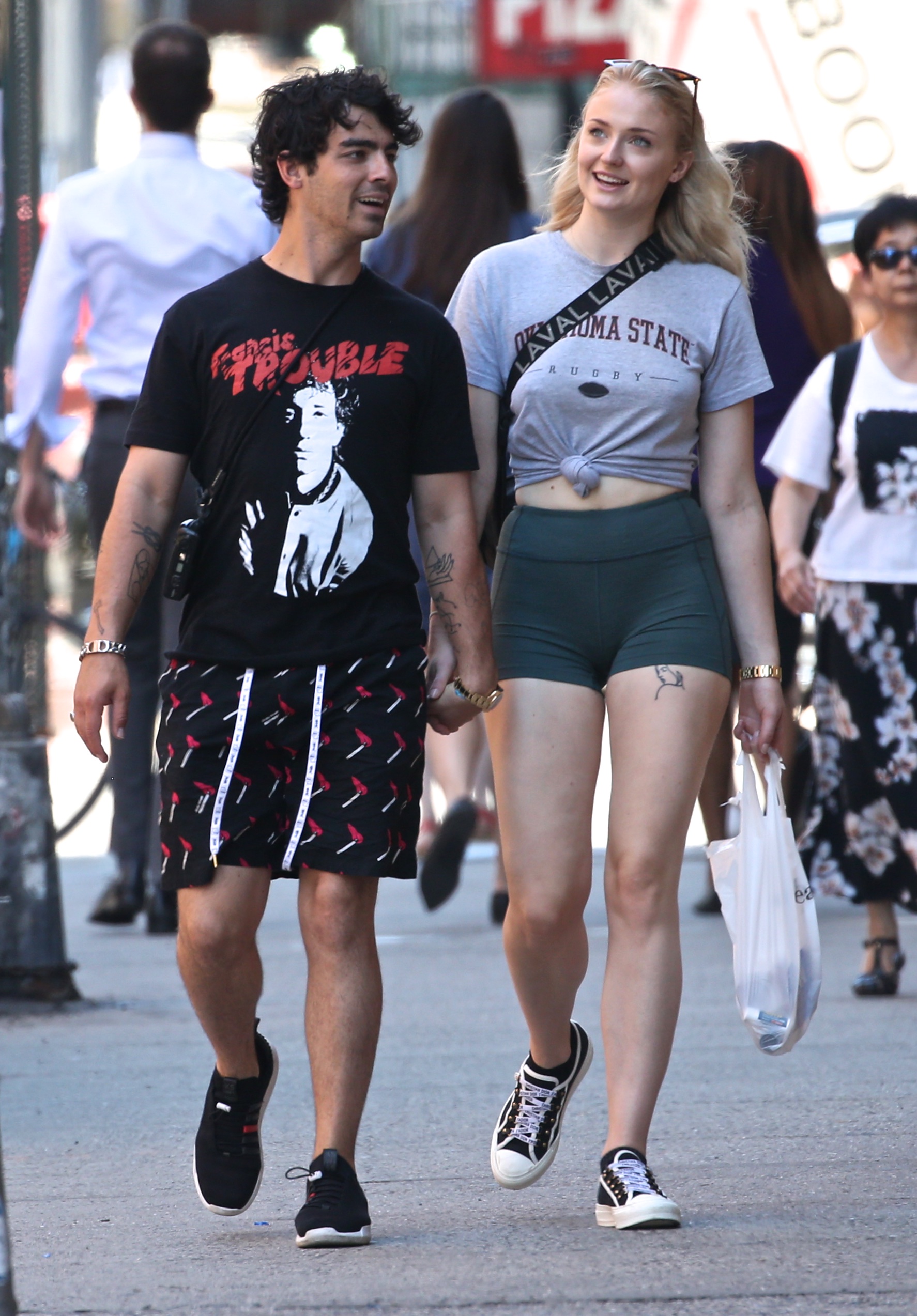 Joe Jonas and Sophie Turner walking together 