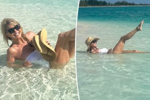 Christie Brinkley poses in a white swimsuit in Turks & Caicos.