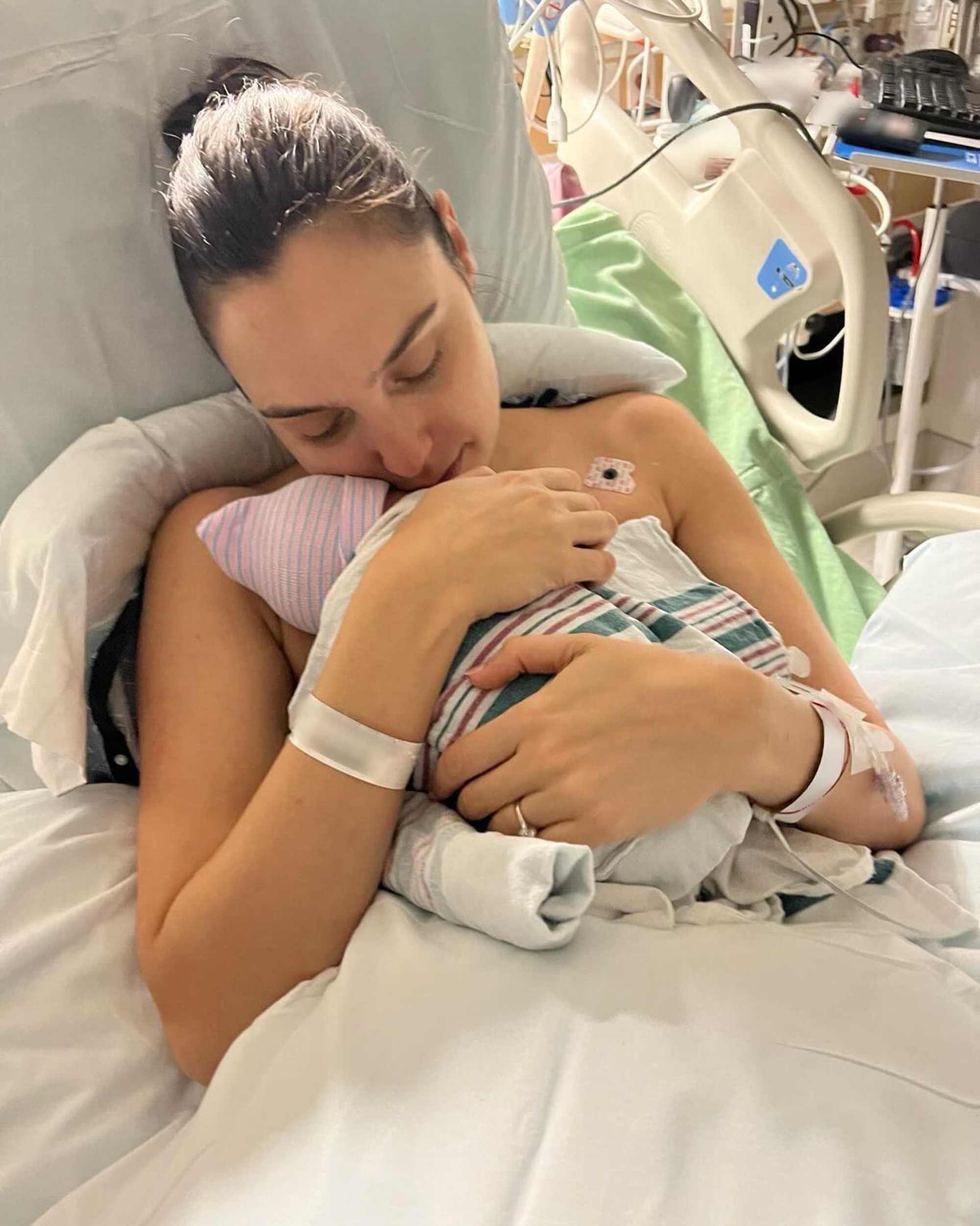 Gal Gadot holding her newborn.