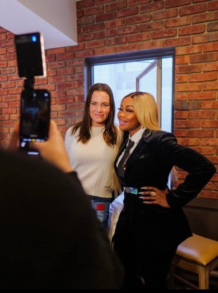 Bravolebrities Meredith Marks and Phaedra Parks strike a pose at the Beverly Hills Rejuvenation Center pop-up in the NFP Lounge at Sundance Film Festival 2024.