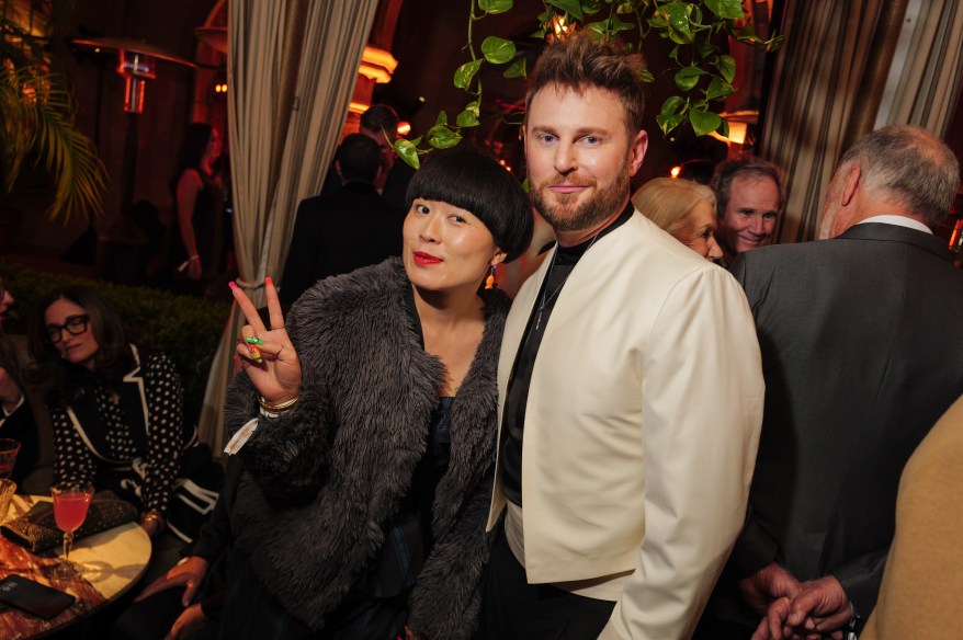 Atsuko Okatsuka and Bobby Berk at The Golden Eve Party held at Chateau Marmont on January 6, 2024 in Los Angeles, California. 