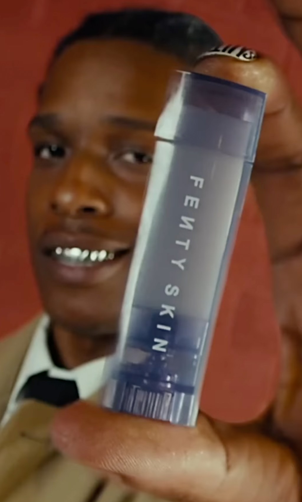 A$AP Rocky holding lip balm