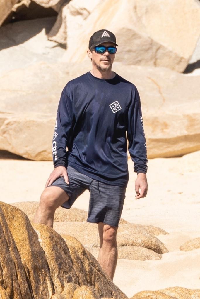 Christian Bale on the beach.