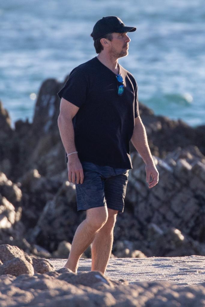 Christian Bale on a beach walk