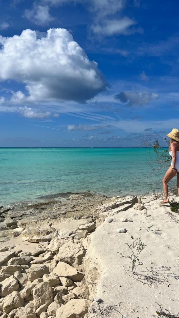 Christie Brinkley poses in a white swimsuit in Turks & Caicos.