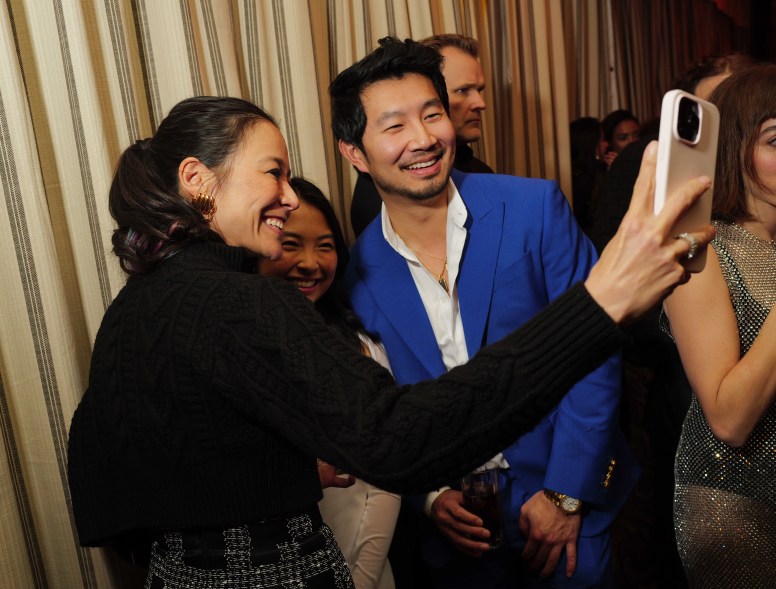 Elizabeth Chai Vasarhelyi, Allison Hsu and Simu Liu at The Golden Eve Party held at Chateau Marmont on January 6, 2024 in Los Angeles, California. 