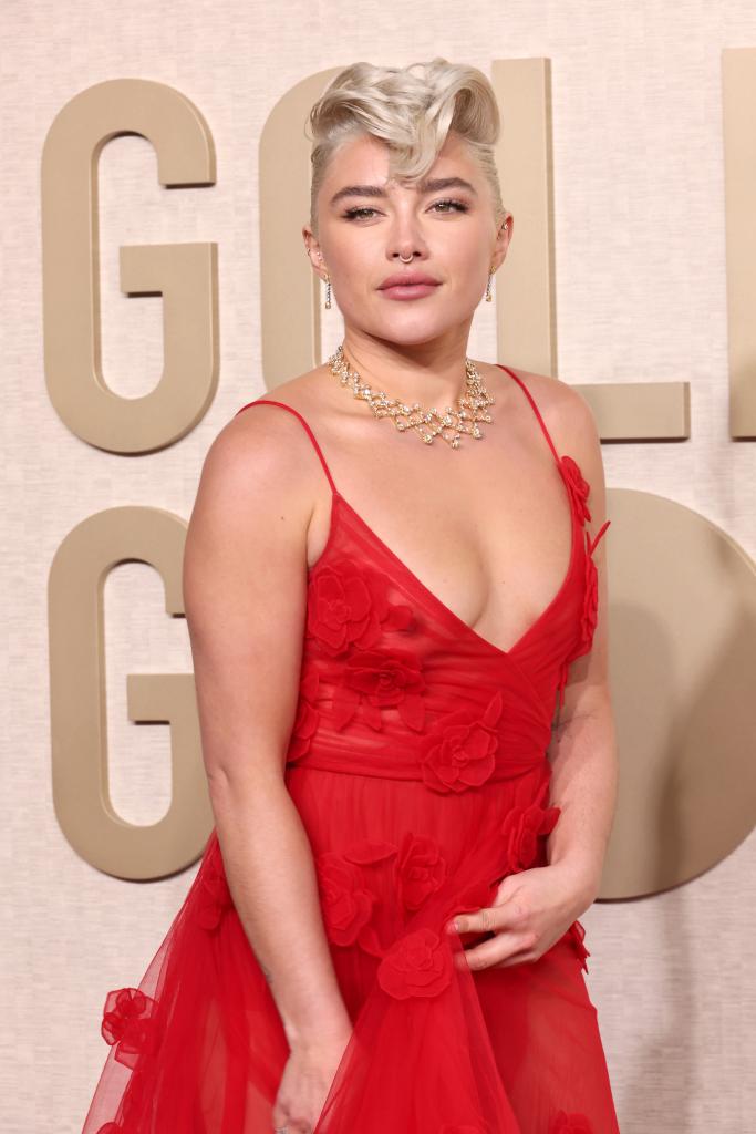 Florence Pugh in a red Valentino gown at the Golden Globes 2024.