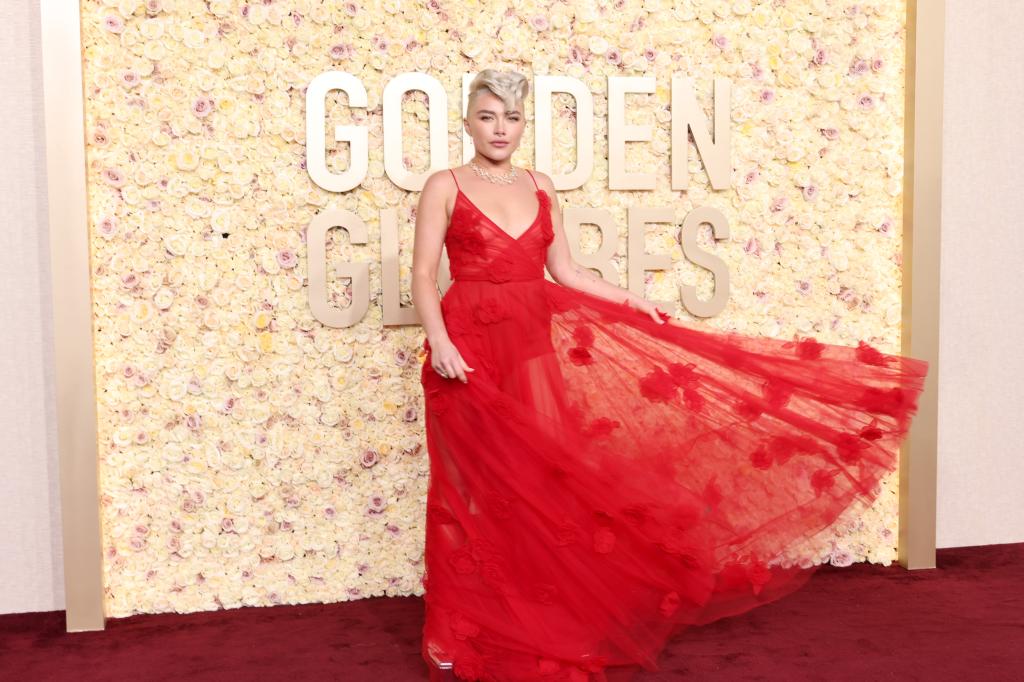 Florence Pugh in a red Valentino gown at the Golden Globes 2024.